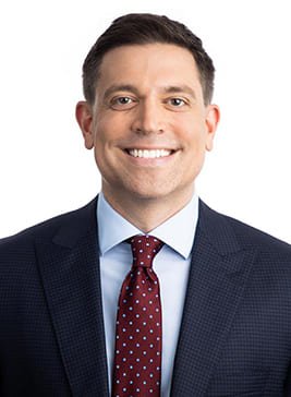 A photograph of Nicholas B. Dunn, President & CEO of PCI-GS